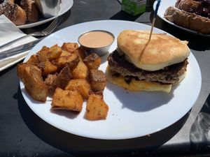 Breakfast sandwich with impossible sausage   at Scratch Breakfast in Vancouver