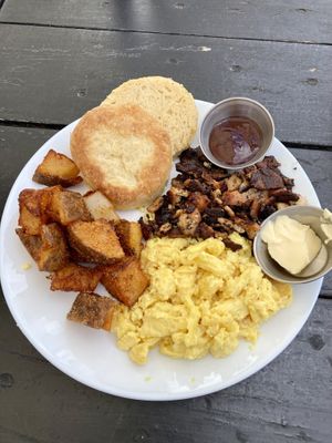 Breakfast plate with scrambled eggs, bacon, and a biscuit 😋   at Scratch Breakfast in Vancouver