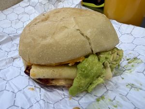 Egg ‘N Cheese Muffin with added bacon and avocado - delicious! 😋   at Scratch Breakfast in Vancouver
