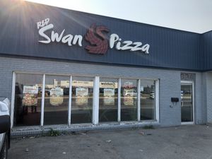 A few parking spots out front   at Red Swan Pizza in Regina
