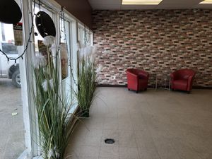 Chairs available for waiting   at Red Swan Pizza in Regina