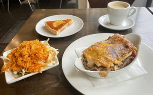Vegan & gluten free lasagne, mixed salads, vegan pie - yum!  at The Greenhouse Cafe in Altrincham