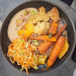 Buckwheat couscous, with broiled carrots & cauliflower, white bean cream, marinated carrot & orange (Vegan, 15e) at Ephéméride in Sare
