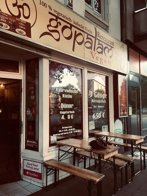 Some outdoors sets, flowers are planted on the side facing the road at Gopalam in Hamburg