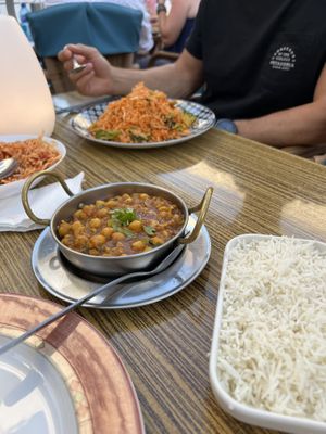 Fried rice with vegetables (in the Background) and chana masala   at INDIANA JOHNS CALA DOR in Mallorca