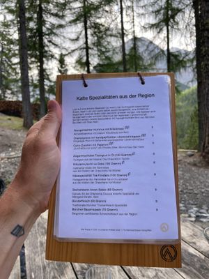 Menu with vegetarian & vegan options clearly listed at Chamanna Cluozza in Zernez