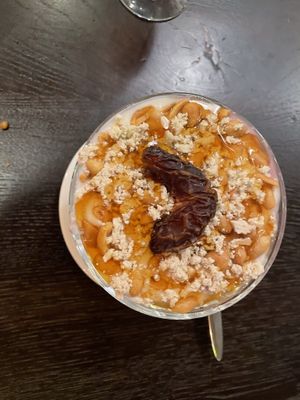 Yoghurt, tahini, peanut, agave and date dessert  at Vegan Africa in Gouda