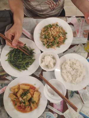 Morning glory, papaya salad, tofu in sweet and sour sauce at Minh Hien in Hoi An