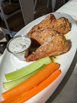 Garlic parmesan wings with blue cheese dressing at Strong Hearts in Buffalo