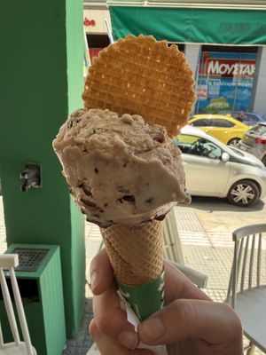 Holy Bueno and Smashed Bueno Sticks ice cream in a cone  at Plan(e)t Ice Cream in Athens