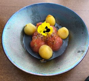 Pickled plum tomatoes   at Tàn Chá Restaurant  in Dubai
