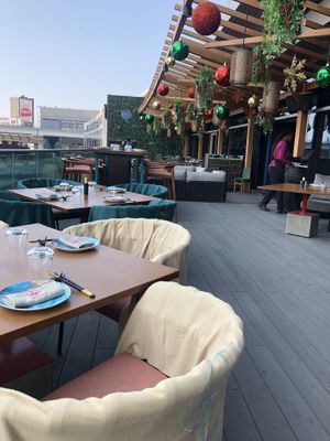The outdoor seating   at Tàn Chá Restaurant  in Dubai