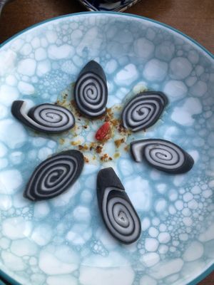 Black sesame roll at Tàn Chá Restaurant  in Dubai