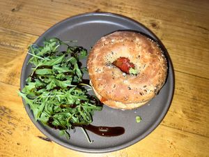 Bagel with hummus, roasted red peppers and avocado  at Seven Districts Coffee in Lincoln