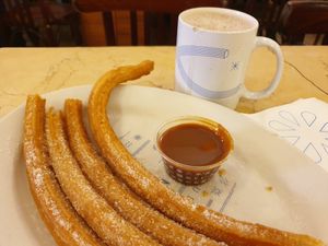 Churros with caramel and hot chocolate at El Moro in Mexico City