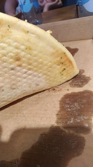 Crust crack is oil on crust at Domino's Pizza in Randers