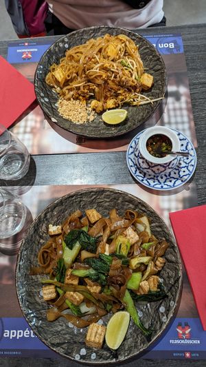 Vegan pad see ew and vegetarian pad Thai (with egg). at Les Amis Asia Dinner in Geneva