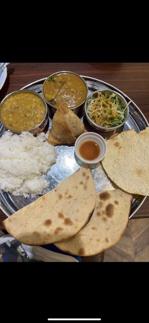 vegan set i believe with roti instead of naan, it includes a vegetable curry, lentil dhal , samosa and salad. i had to ask for a mini rice.  at Jyoti in Sapporo