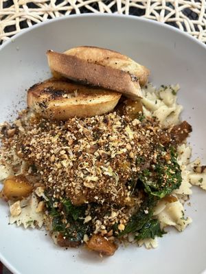 Butternut & Kale bowtie pasta with garlic   at Vegan A.F. in Brattleboro