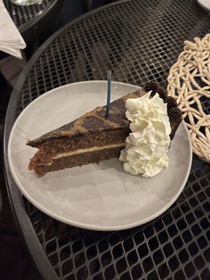 Peanut butter chocolate torte with whipped topping   at Vegan A.F. in Brattleboro