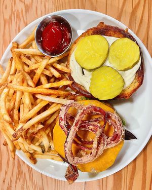 BBQ burger w/ house made patty, crispy pickled onions✨delicious!  at Seabirds Kitchen in Los Angeles