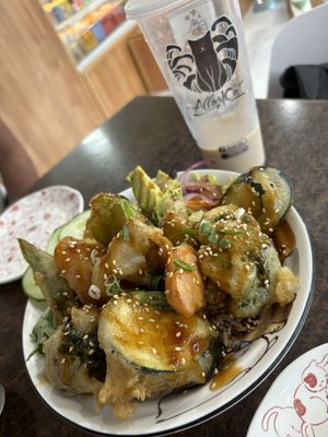 Rice bowl with tempura veggies and teriyaki sauce. And my almost finished coconut milk tea with pearls 🤣   at Alley Cat in Airlie Beach