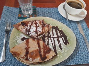 Pancake with banana, chocolate, and peanut butter at The Happy Cat - Veggie Cafe-Restaurant in Luang Prabang