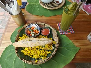 Scrambled Tofu and Matcha-Mango-Oatmilk Smoothie at The Happy Cat - Veggie Cafe-Restaurant in Luang Prabang
