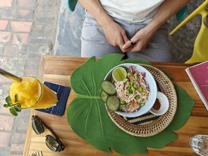 Nutty Noodle Salad and Mango- Coconut Water- Coconut Flake Smoothie at The Happy Cat - Veggie Cafe-Restaurant in Luang Prabang