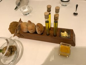 Bread and oil with some vegan and some dairy butter at TIAN Restaurant in Vienna