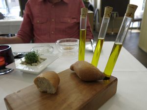 Oils in test tubes with complimentary bread at TIAN Restaurant in Vienna