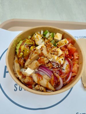 Large poke bowl with rice, tofu, heura (vegan protein that looks like meat chunks), avocado, vegetables. Yummy! at Poké Poké - Triana in Gran Canaria