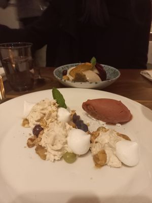 Mini aquafaba merinques, glazed chestnuts, whiskey-chestnut foam, plum sorbet at Enja in Zurich