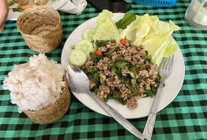 Spicy larb with sticky rice! The best I've ever eaten at Veggie Tables in Vang Vieng