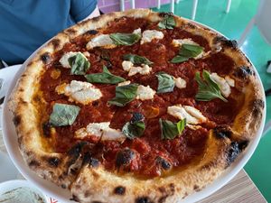 Crushed tomato pizza  at Everyday Pizza in Denver