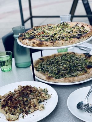Brussels sprouts pizza, pea pizza, and rigatoni  at Everyday Pizza in Denver