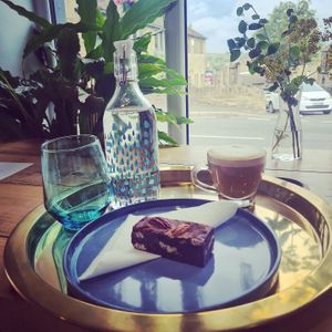 Lots of coffees and cakes available to eat in or take away. at Grow Green Deli + Eatery in Huddersfield