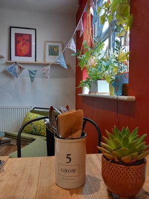 Upstairs, cool vibe, tunes, cushions & throws at Grow Green Deli + Eatery in Huddersfield