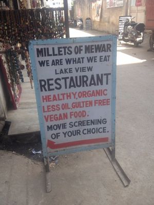 Sign on how to find it at Millets of Mewar in Udaipur