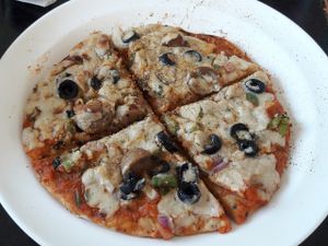 pizza with cashew cheese at Millets of Mewar in Udaipur