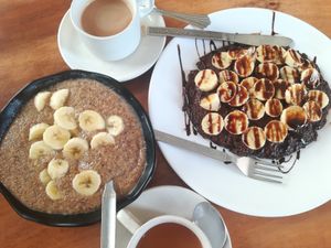 Millet porridge, nutella pancake, masala tea with coconut milk at Millets of Mewar in Udaipur