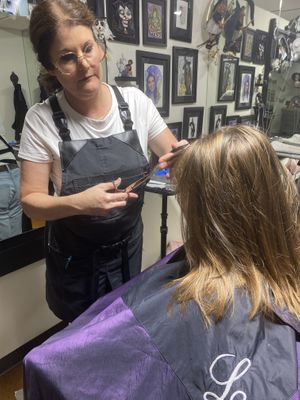 Owner Laurie Howard with client   at Wicked Salon in North Little Rock