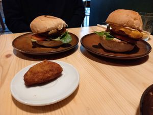 Catalan and Santa Vegana burger. Croquette at Santa Vegana in Barcelona