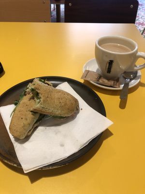 Avocado sandwich & oat latte  at Santa Vegana in Barcelona