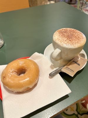 Donut and cappuccino   at Santa Vegana in Barcelona