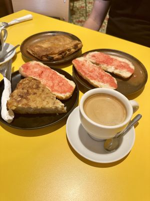 Potato tortilla, empanada, and an extra portion of pan con tomate!  at Santa Vegana in Barcelona