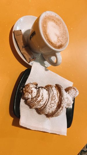 Coffee and chocolate croissant  at Santa Vegana in Barcelona