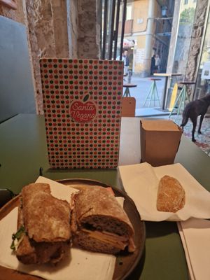 Ham and cheese with mayo and pumpkin empanada (family recipe) yum! at Santa Vegana in Barcelona