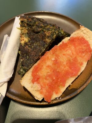 Tortilla de espinaca (viene con pan con tomate )  at Santa Vegana in Barcelona