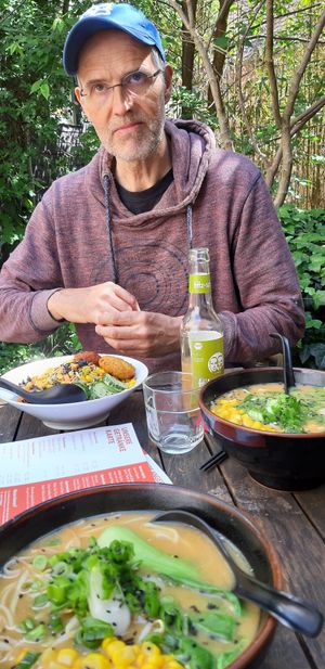 Guy with Mix Salat und Vegan Miso Ramen at 957 Ramen Bar in Marburg